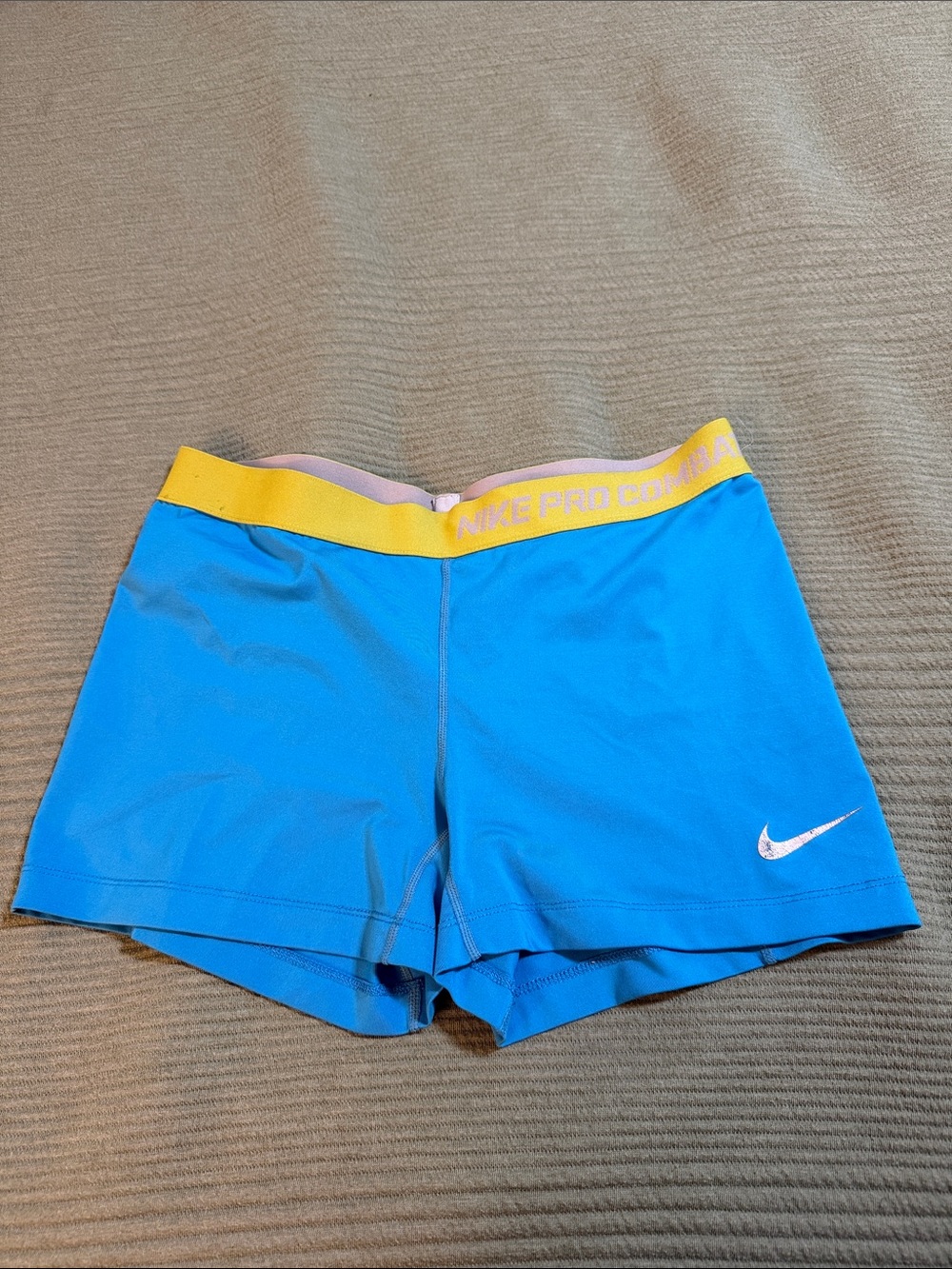 Nike Blue Compression Shorts with Yellow Waistband